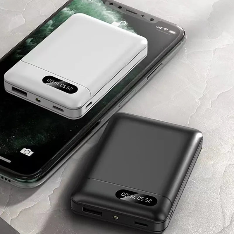 Black and white portable power bank with multiple USB charging ports