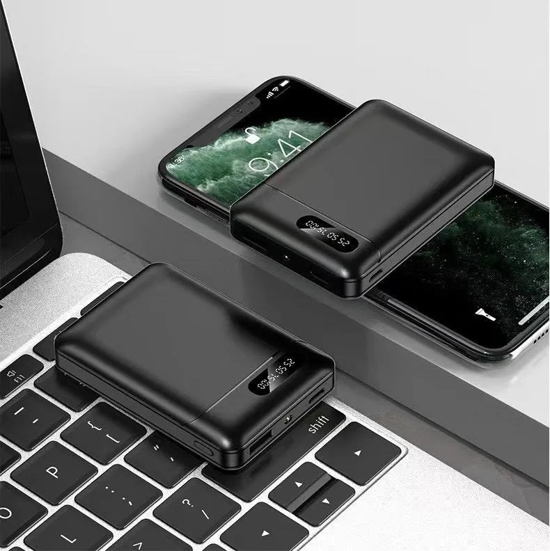 Black and white portable power bank with multiple USB charging ports