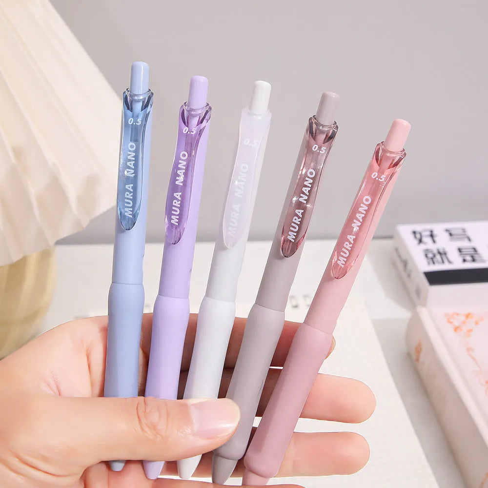 Macaron coloured press gel pen with 0.5mm tip in smoked brown, smoked powder, and smoked white refill options.