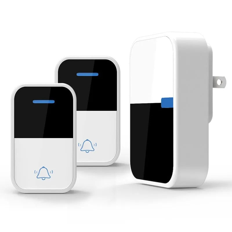 White plastic wireless doorbell receiver and transmitter units on a plain background