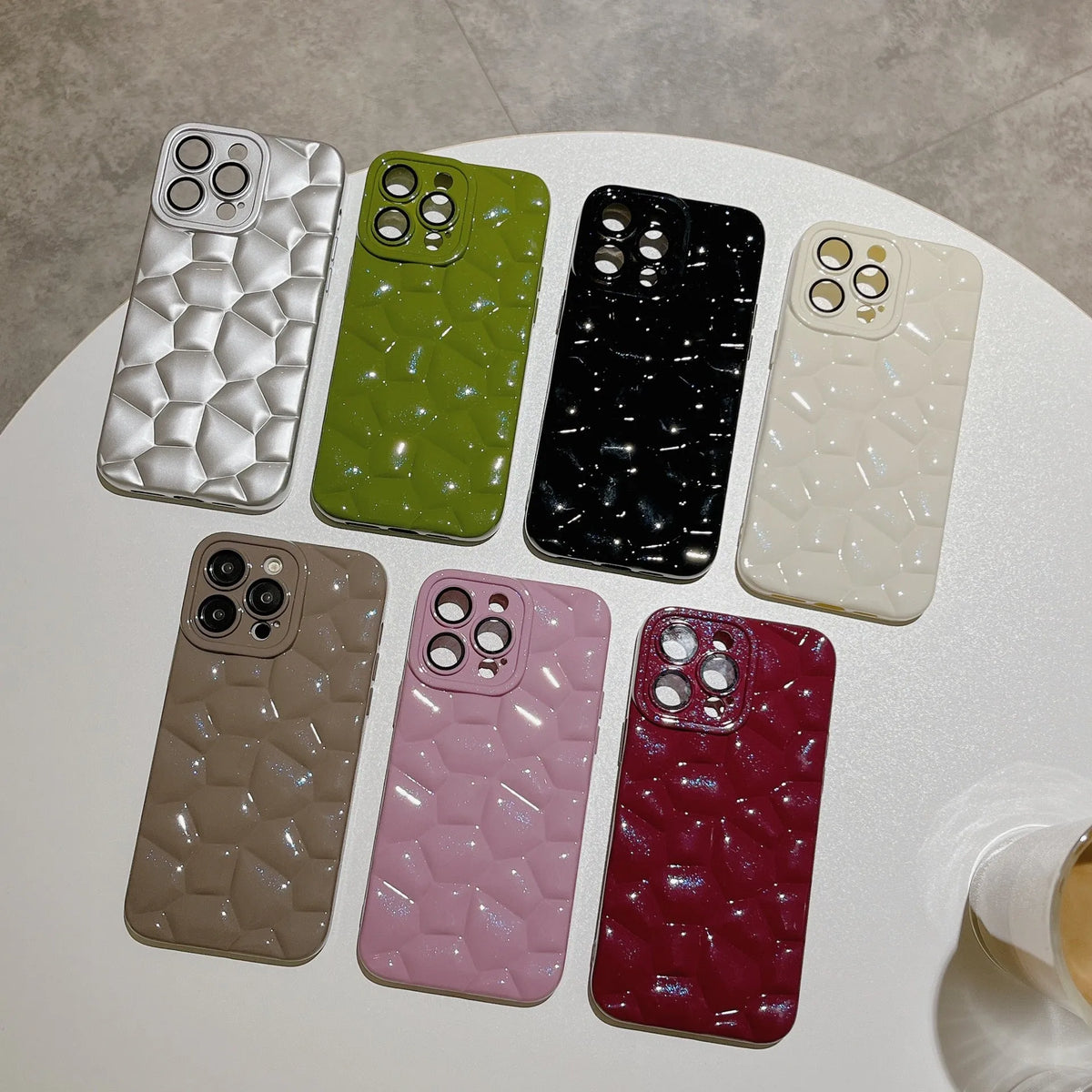 Pebble TPU iPhone case with lens protector in black, brown, silver, or white for iPhone 11 to 15 Pro Max