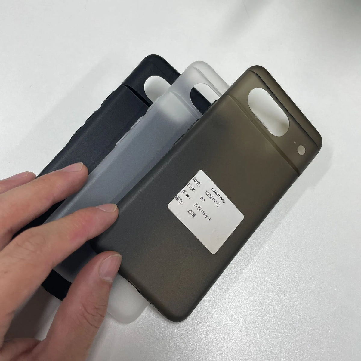 PP frosted anti-fingerprint phone case for Google Pixel in transparent white, transparent black, or solid black.