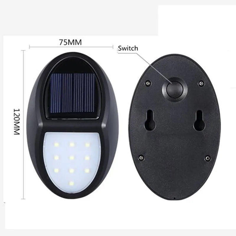 Black rectangular LED solar wall light mounted on an outdoor surface