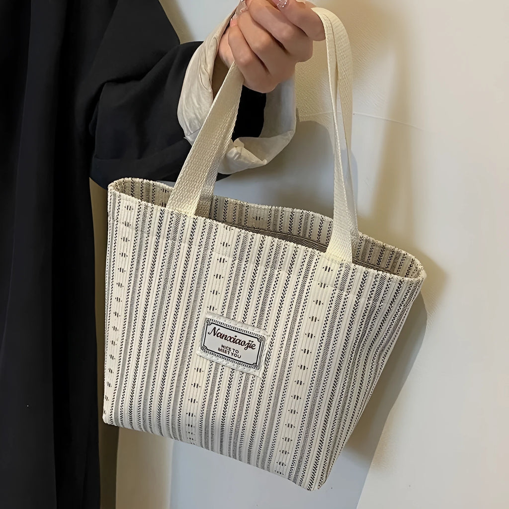 Japanese style corduroy shoulder tote handbag in dark brown colour showing textured fabric and large capacity design