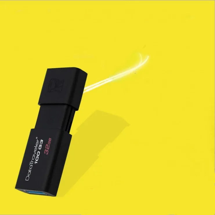 Black ABS sliding cover USB flash drive on table, available in 16GB to 512GB capacities for phone and computer data transfer.