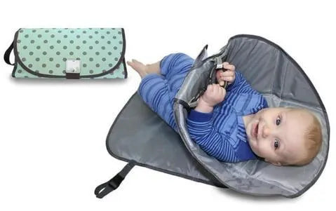 Portable diaper changing mat in oxford cloth, 70 x 50cm, folded size 38 x 17cm, with toy rings and strap