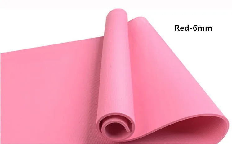 EVA foam yoga mat in blue, showing textured anti-slip surface, with a black OPP storage bag beside it.