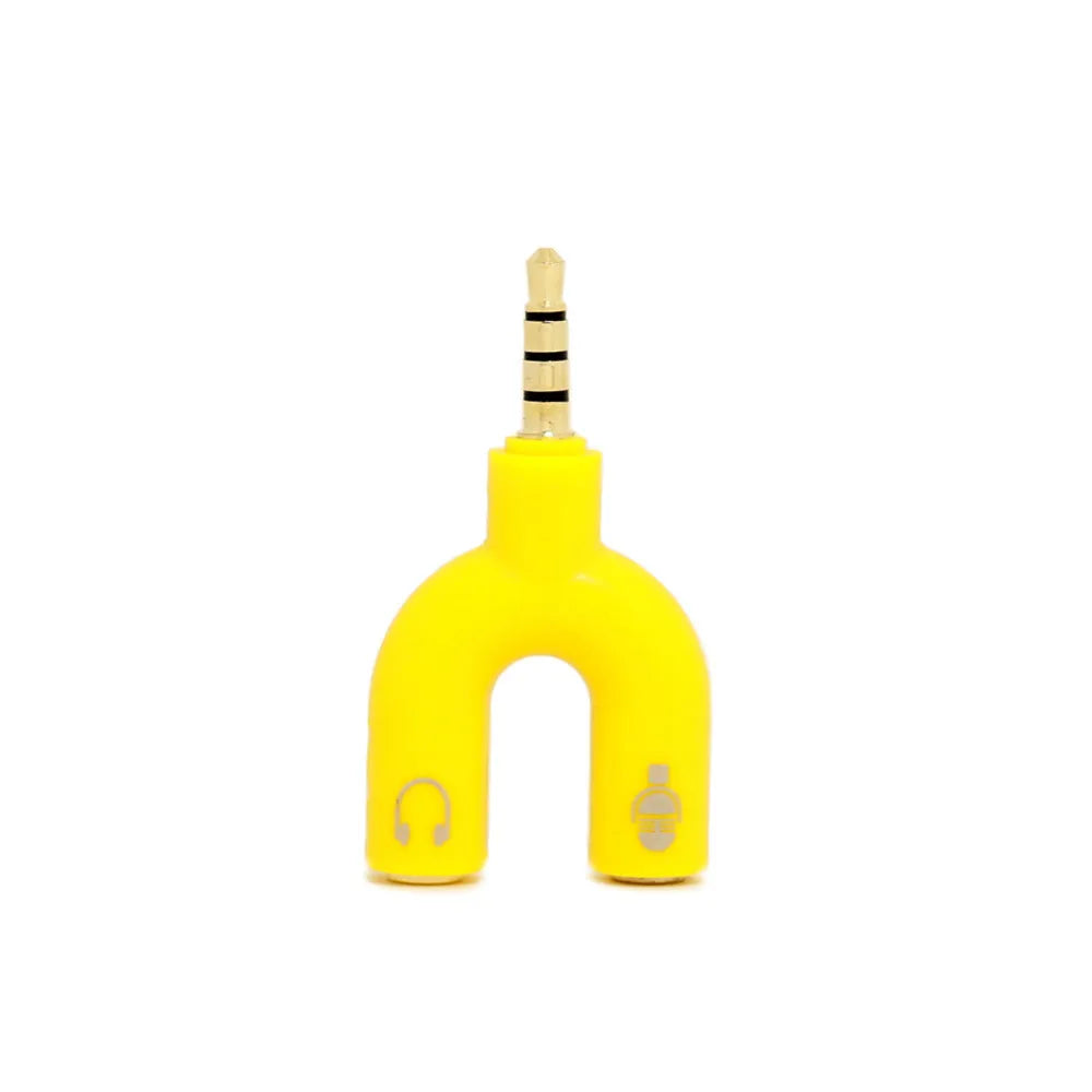 White 3.5mm audio splitter adapter with one male and two female gold-plated connectors on a dark background.