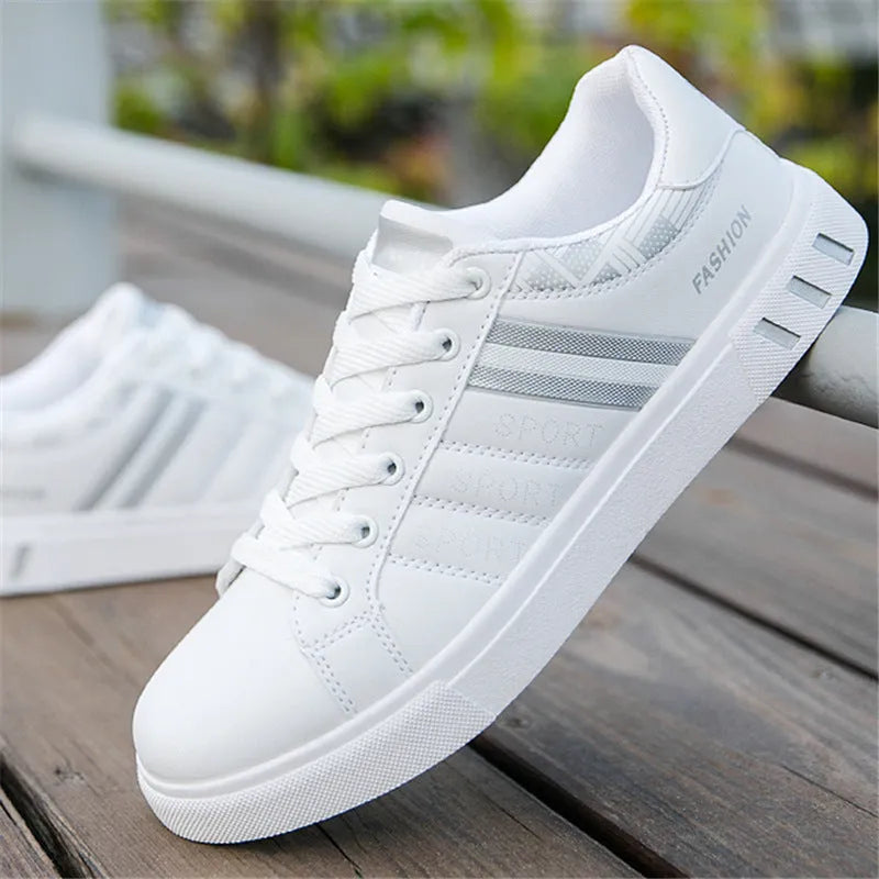 A pair of black sports shoes displayed on a white background, showing the side profile and sole.