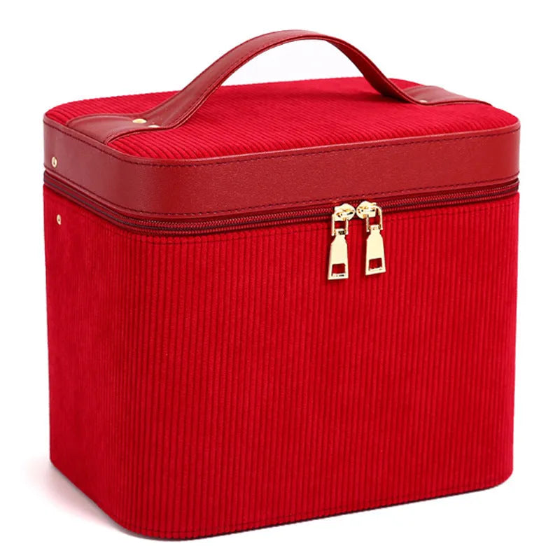 Corduroy cosmetic storage box in a solid colour with a lined interior.