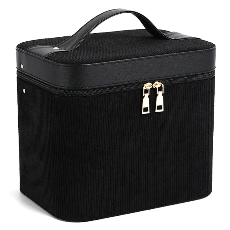 Corduroy cosmetic storage box in a solid colour with a lined interior.