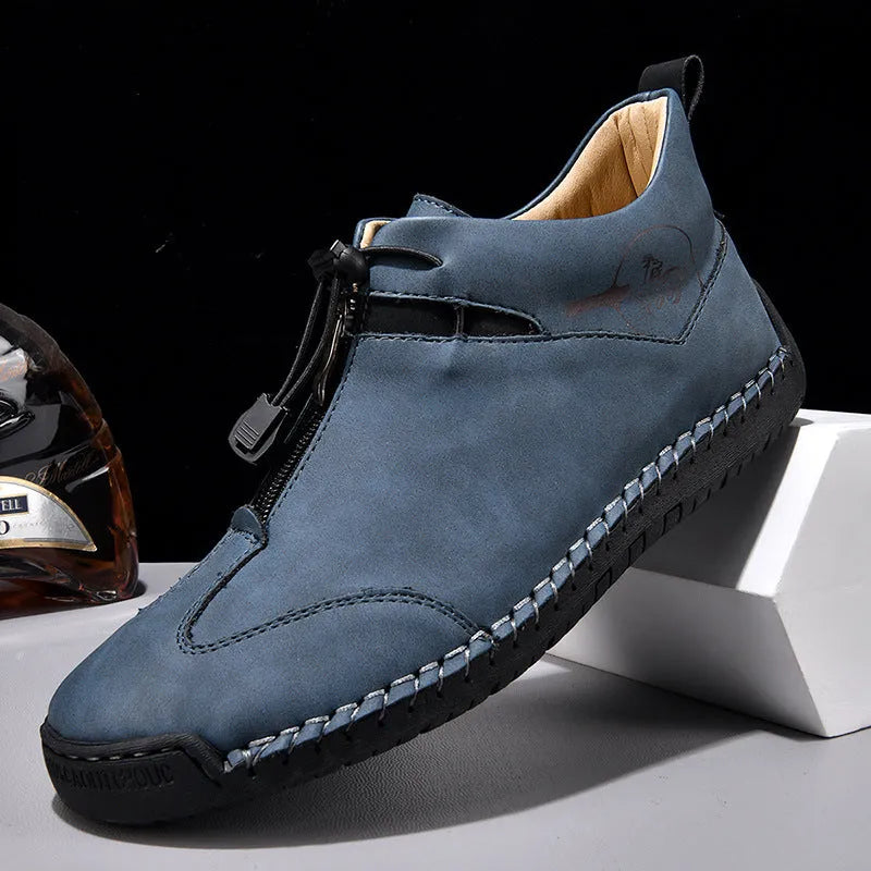 Men's casual leather shoes in green with round toe, rubber sole, and mid heel.