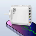 White mobile phone charging plug with USB-A port and interchangeable plug adaptors