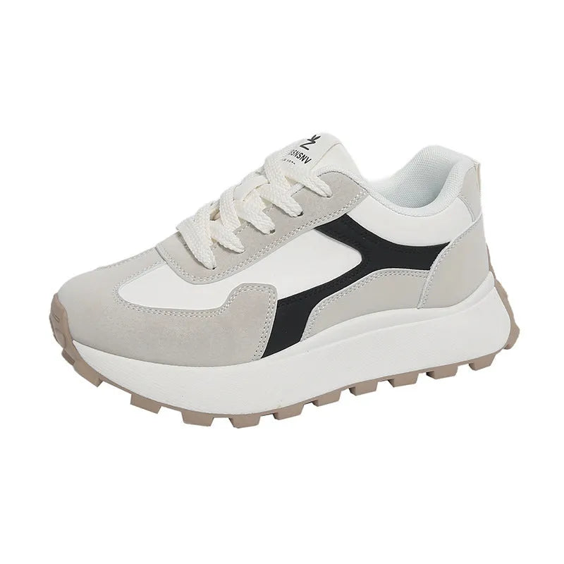 Women's solid colour low-top platform trainers with lace-up front and flat rubber sole
