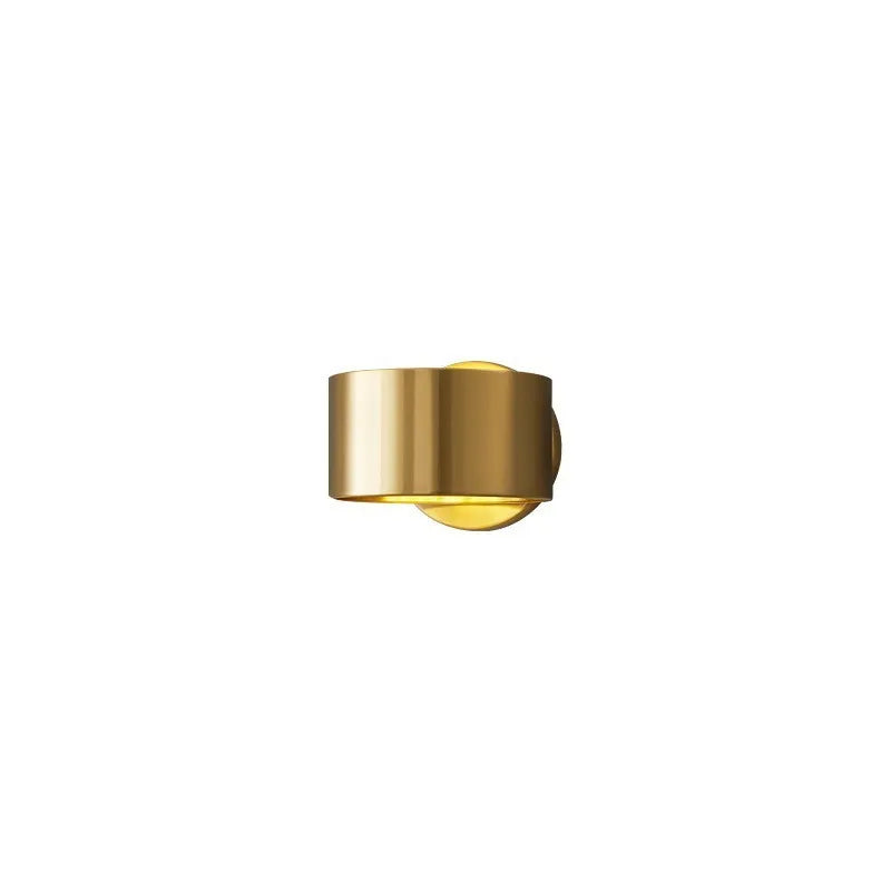 Modern simple style copper wall lamp in a choice of black or gold finish.