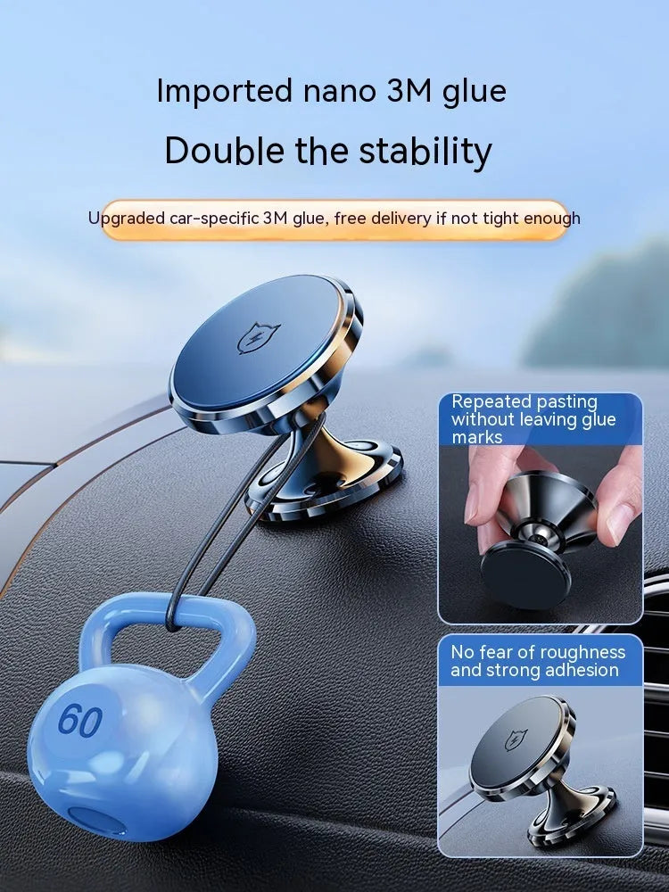 Shiny black magnetic car phone holder with adhesive base mounted on a car dashboard.
