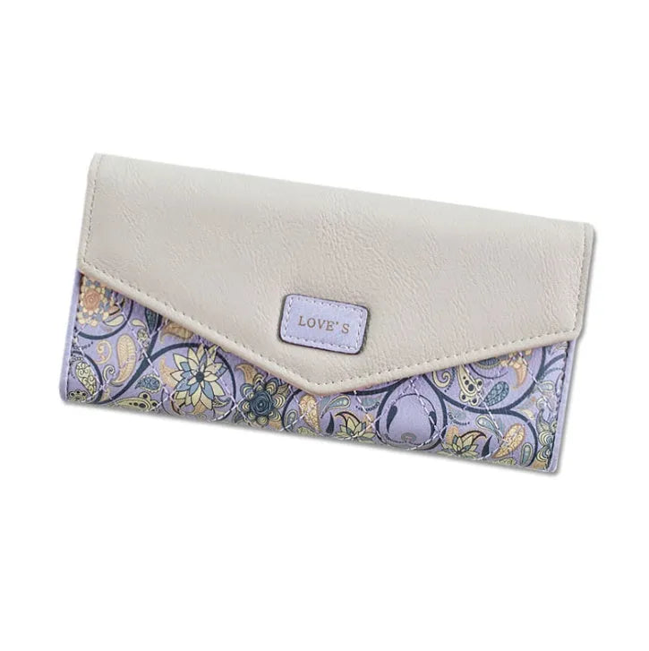 Women's large capacity three-fold PU leather wallet with buckle closure in multiple colours.