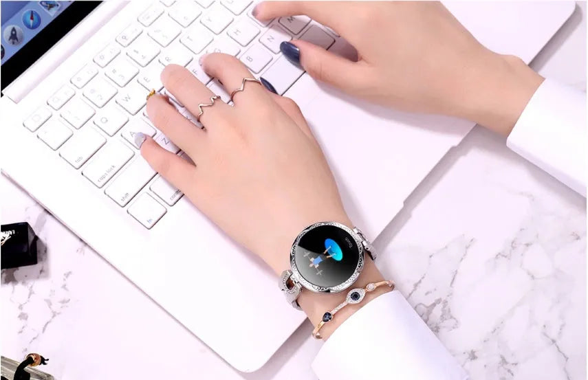 Women's IP67 waterproof smart watch, 38mm round dial, stainless steel strap, Rose Gold Silvery Violet colour options