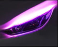 Car LED daytime running light strip with flowing turn signal effect in blue to yellow colour.