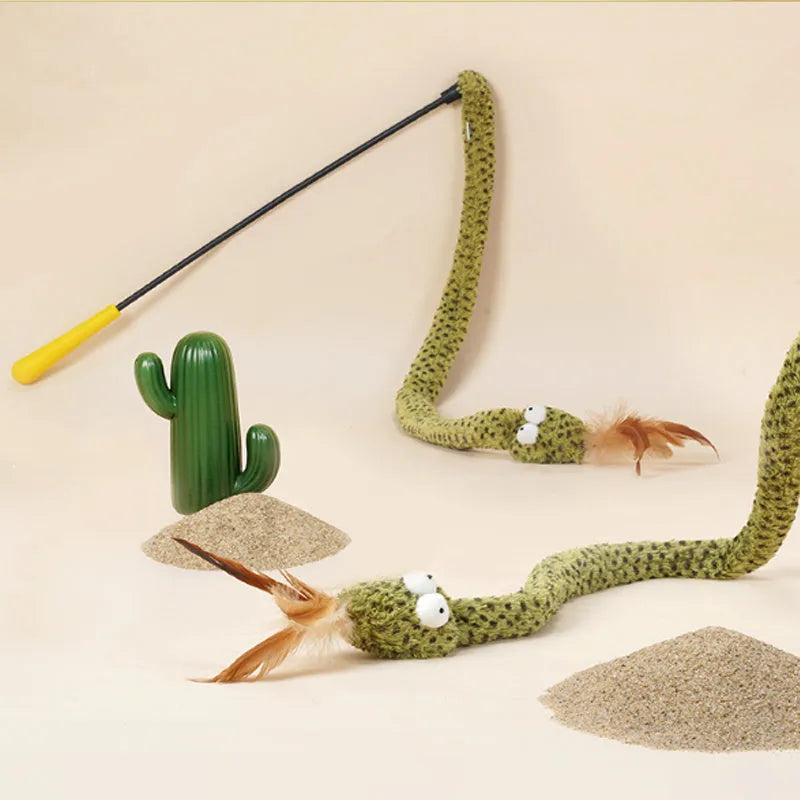 Green cat teasing stick with feather attachment measuring 140cm long