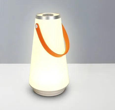 White rechargeable LED table lamp with square base and warm light illumination