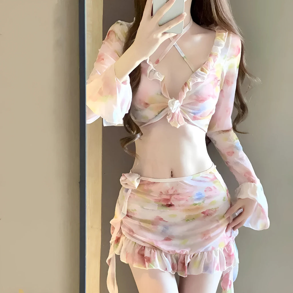 Women's cherry blossom pink floral print bikini set on a mannequin