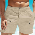 Men's straight leg linen shorts in white with elastic waistband and button pockets.