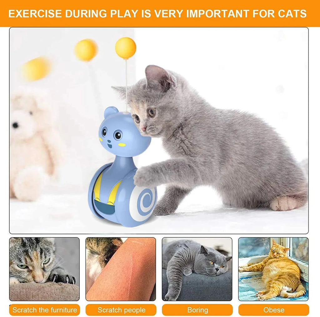 Blue and pink cat interactive tumbler toys with rotating balls and feather wands on flat surface