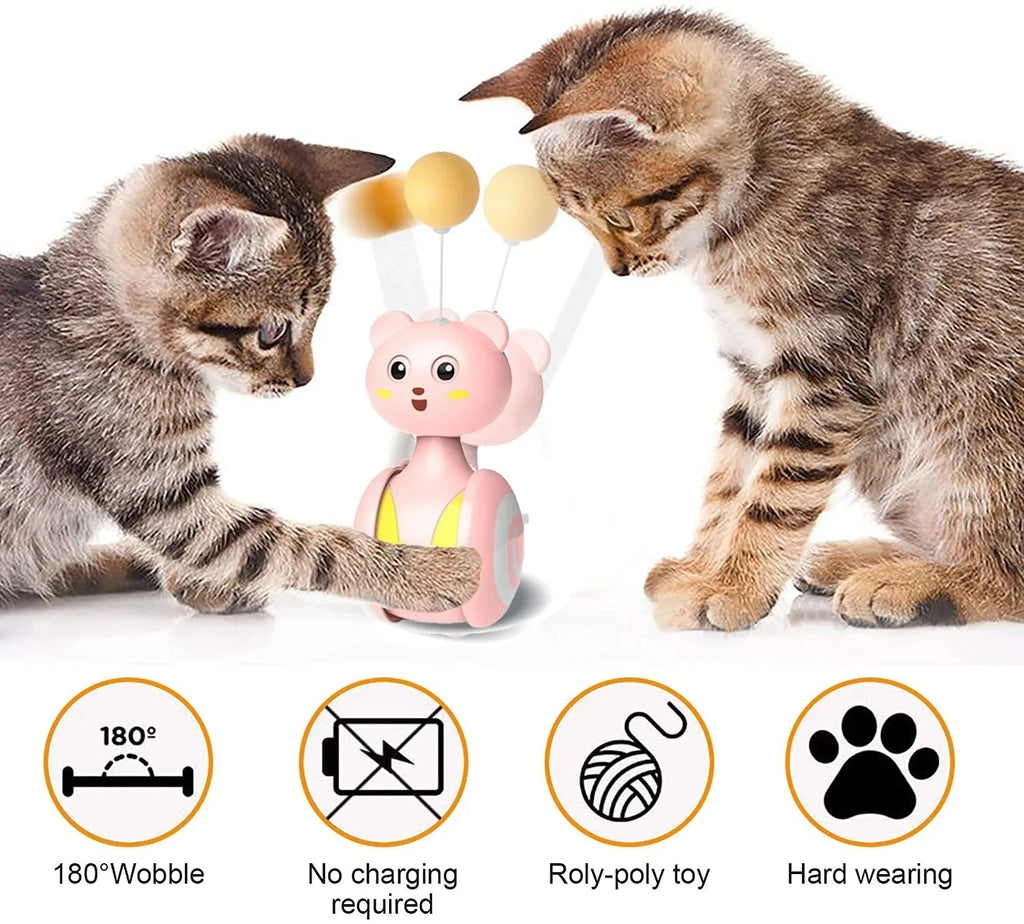 Blue and pink cat interactive tumbler toys with rotating balls and feather wands on flat surface