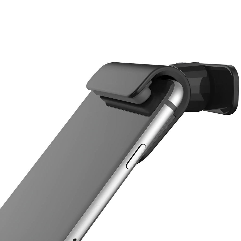 Black universal car phone holder with 360-degree rotation on a car dashboard.