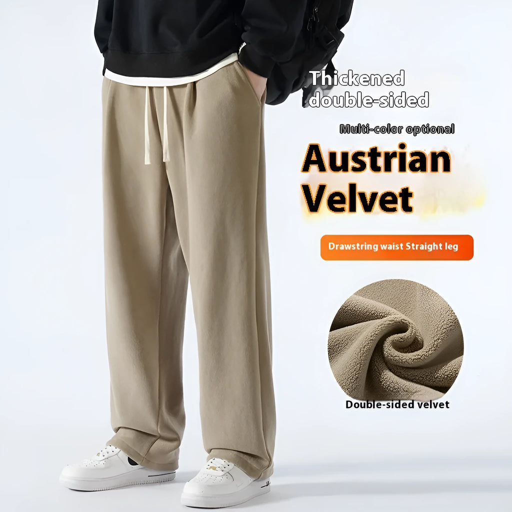 Man wearing apricot double-sided polar fleece lined loose fit casual sports trousers.