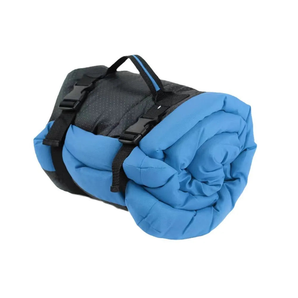 Blue foldable waterproof outdoor dog bed shown both unfolded and folded with buckles.