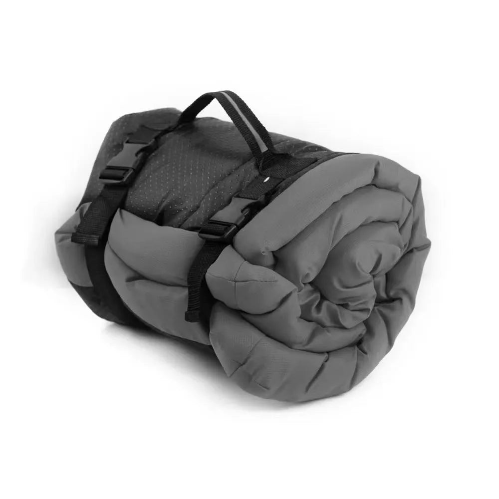 Blue foldable waterproof outdoor dog bed shown both unfolded and folded with buckles.