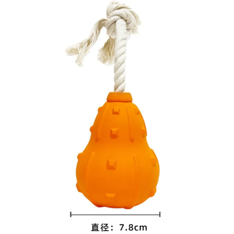 Natural rubber stuffable dog toy with a long strap for fetch and treat dispensing.