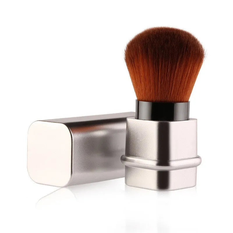 Portable single makeup brush with man-made fibre bristles and plastic handle in gold or silver, 8.1cm size, 40g weight