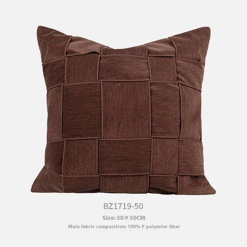 Square chenille woven cushion in a choice of colours, shown on a sofa, measuring 50x50cm.