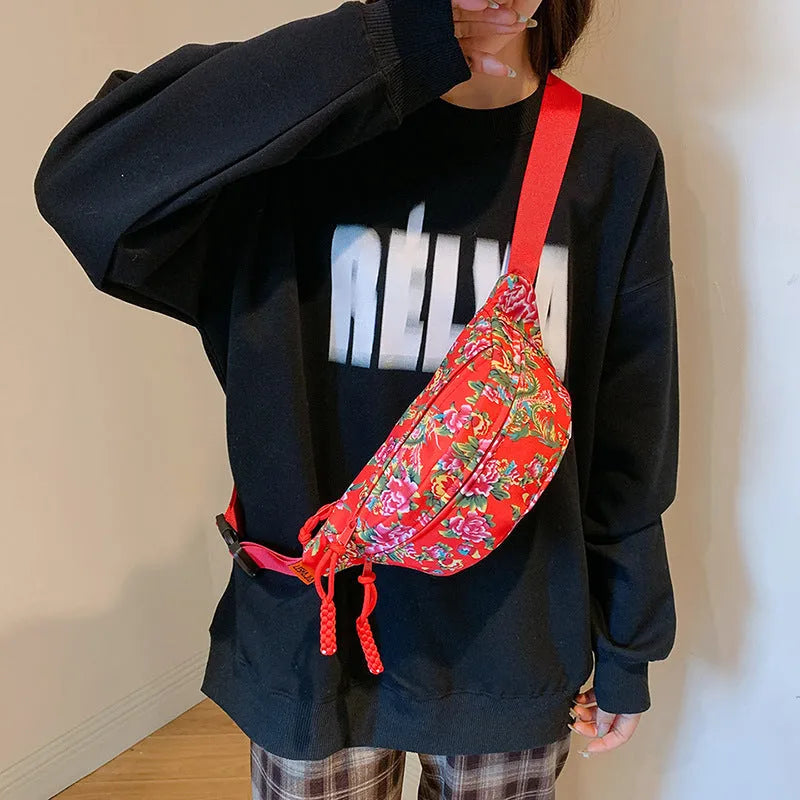 Women's western style waist bag with floral embroidery in black, red, green or blue colours