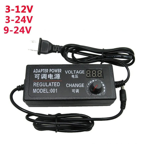 Compact black adjustable power adapter with LED digital display showing voltage output on a white background