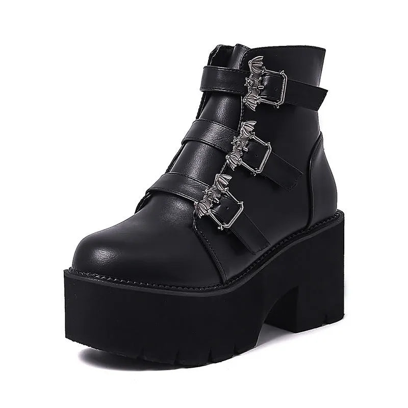 Black women's punk style Martin boots with a side zipper and thick heel.