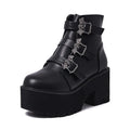 Black women's punk style Martin boots with a side zipper and thick heel.