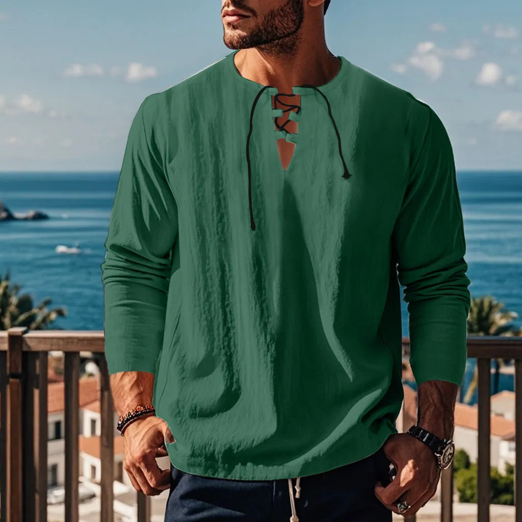 Cotton linen blend solid colour beach shirt in a loose pullover style on a hanger.