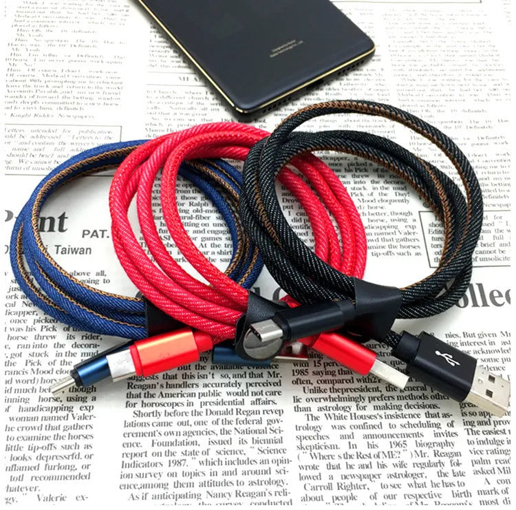 Cowboy-style denim USB-C charging cable with aluminium connectors in black, blue, or red.