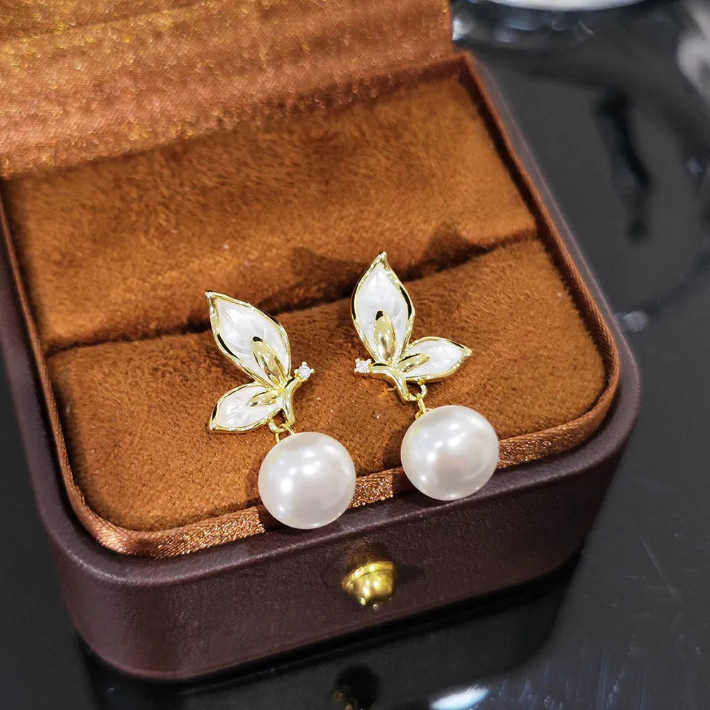 Copper butterfly earrings for women with electroplated finish and zircon painting details
