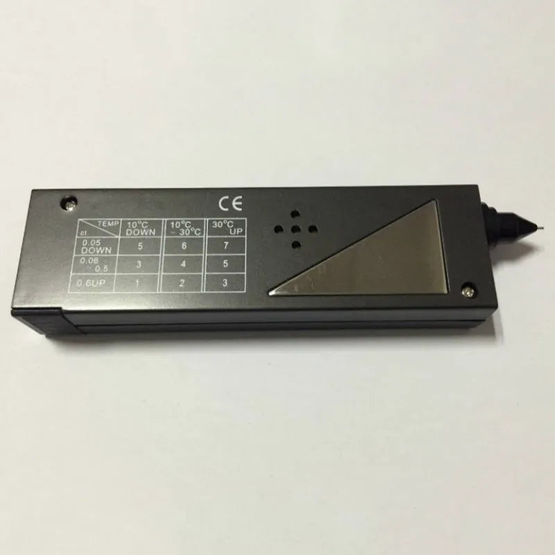 Second generation black diamond thermal conductivity tester with metal probe for gem identification.