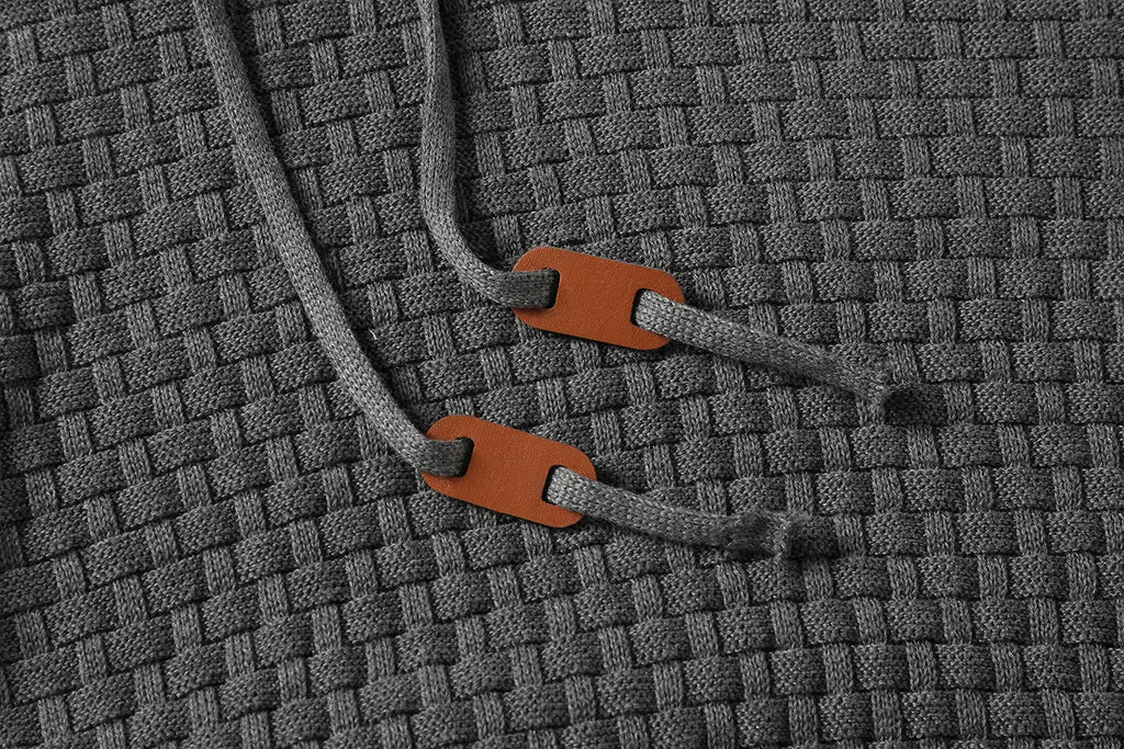 Men's grey cotton-polyester blend hooded sweatshirt on a hanger, showing front design and hood.