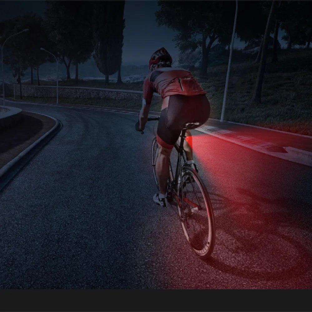 Black aluminium smart brake sensing USB rechargeable bicycle taillight with COB LED.