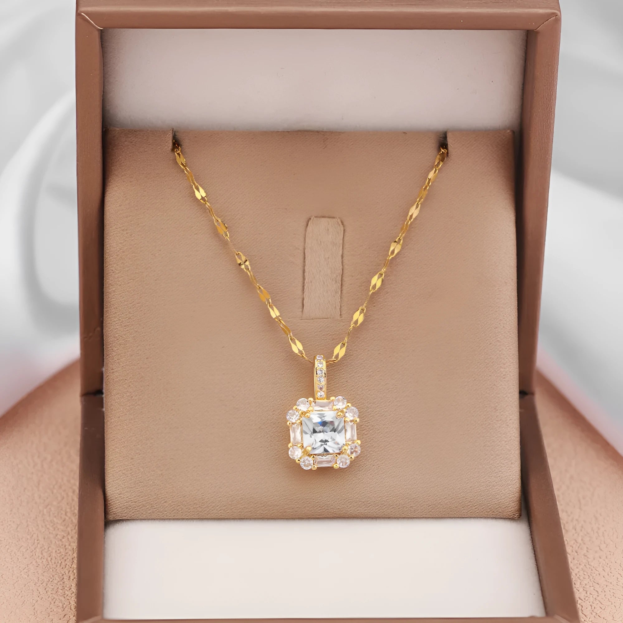 Gold titanium steel clavicle chain with quadrilateral zircon pendant on water wave chain