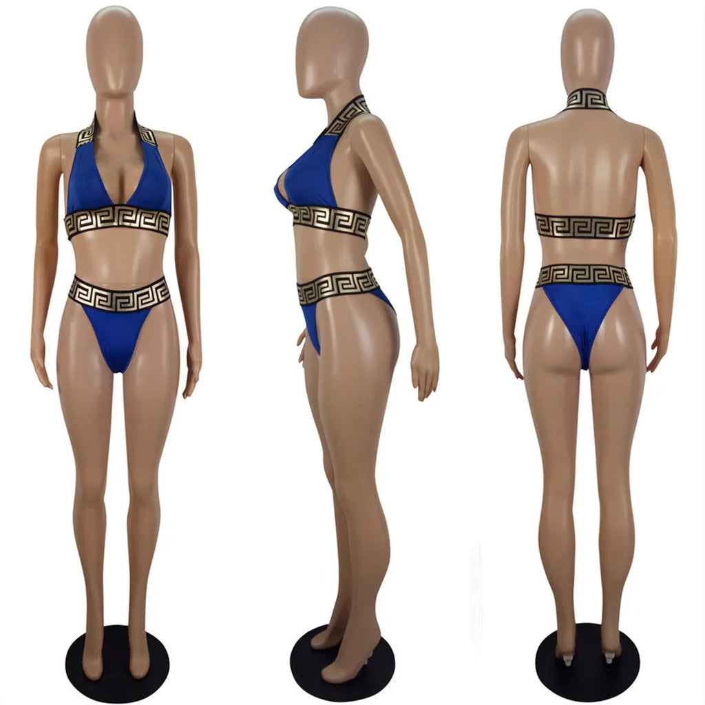 Printed bikini two piece set in polyester, available in yellow, red, black, green, and blue. Wire-free, unpadded design for swimming and wading. Sizes S-XL.
