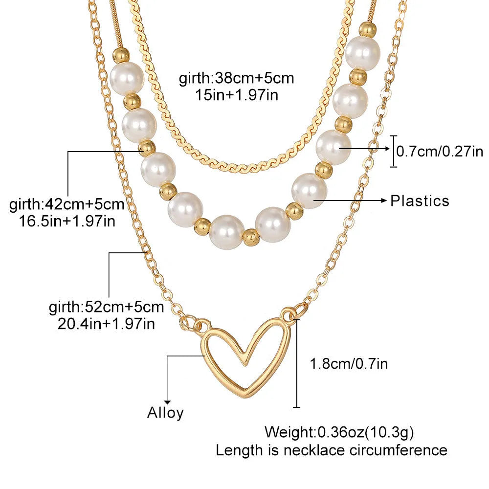 Vintage gold necklace with heart pendant on pearl chain, adjustable length 41-50cm