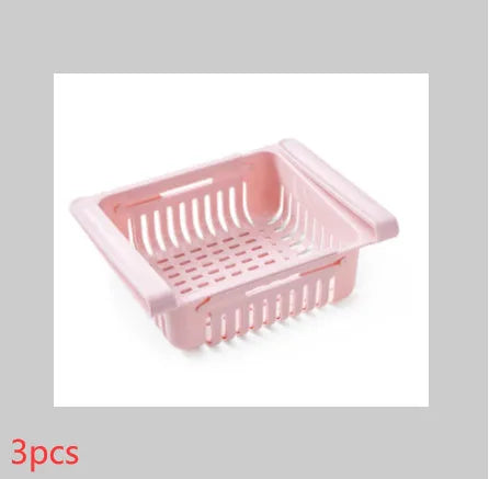 Telescopic plastic refrigerator storage basket in blue colour organising fruits and vegetables in drawer